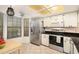 Modern kitchen with stainless steel appliances and granite countertops at 9404 Rockbridge Cir # 9404, New Port Richey, FL 34655