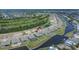 An aerial view shows a beautiful home near the golf course and waterfront at 1074 Signet Dr, Apollo Beach, FL 33572