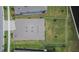 A bird's eye view shows the roof and yard of this well-maintained single-Gathering home at 1074 Signet Dr, Apollo Beach, FL 33572