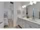 Double vanity bathroom that connects to the bedroom at 1074 Signet Dr, Apollo Beach, FL 33572