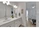 Double vanity bathroom that connects to the bedroom at 1074 Signet Dr, Apollo Beach, FL 33572