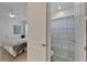 A partial view of the Primary bathroom from the bedroom doorway at 1074 Signet Dr, Apollo Beach, FL 33572
