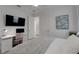This bedroom has a modern desk area with a large flat screen television at 1074 Signet Dr, Apollo Beach, FL 33572