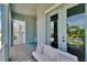 Covered front porch featuring comfortable seating and a view of the home's exterior at 1074 Signet Dr, Apollo Beach, FL 33572