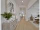 Spacious hallway showing easy access to the dining room, living room, and front foyer at 1074 Signet Dr, Apollo Beach, FL 33572