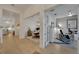 Hallway with direct access to the dining room on the left and an office to the right at 1074 Signet Dr, Apollo Beach, FL 33572