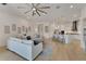 The living area transitions into a kitchen, creating an airy space for entertaining at 1074 Signet Dr, Apollo Beach, FL 33572
