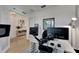 Contemporary home office with dual monitors, stylish decor, and plenty of space for productivity at 1074 Signet Dr, Apollo Beach, FL 33572