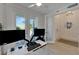 Bright office space with dual monitors and direct access to the outside balcony at 1074 Signet Dr, Apollo Beach, FL 33572