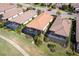 Aerial view of houses with pools and screened lanais at 13118 Sorrento Way, Bradenton, FL 34211