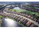 Aerial view of community near golf course and lake at 13118 Sorrento Way, Bradenton, FL 34211