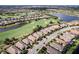 Beautiful aerial view of houses in golf course community at 13118 Sorrento Way, Bradenton, FL 34211