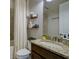 Bathroom with granite countertop, shower, and updated fixtures at 13118 Sorrento Way, Bradenton, FL 34211