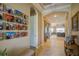 Bright and spacious entryway with tile flooring and picture gallery wall at 13118 Sorrento Way, Bradenton, FL 34211
