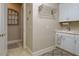 Laundry room with white cabinets and built-in drying rack at 13118 Sorrento Way, Bradenton, FL 34211