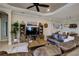 Spacious living room with sectional sofa and open floor plan at 13118 Sorrento Way, Bradenton, FL 34211