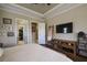 Main bedroom with large bed, walk-in closet, and ensuite bathroom at 13118 Sorrento Way, Bradenton, FL 34211