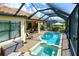 Relax and enjoy this amazing pool and spa with covered patio and outdoor kitchen at 13118 Sorrento Way, Bradenton, FL 34211
