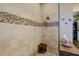 Large walk-in shower with tile surround and built-in bench at 13118 Sorrento Way, Bradenton, FL 34211