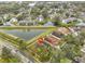 Aerial view showing house location near a lake at 16402 Lake Heather Dr, Tampa, FL 33618