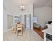 Casual dining area with wood floors and a view of the backyard at 16402 Lake Heather Dr, Tampa, FL 33618