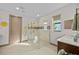 Bright bathroom features a glass-enclosed shower, modern vanity, and neutral color palette at 17702 Cresswind Ter, Bradenton, FL 34211