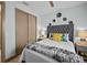 Cozy bedroom featuring a plush bed, decorative wall art, and natural light at 17702 Cresswind Ter, Bradenton, FL 34211
