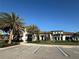 Spacious clubhouse with ample parking, palm trees, and accessible parking spots at 17702 Cresswind Ter, Bradenton, FL 34211