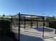 Fenced dog park with seating and play area, perfect for furry friends to socialize and play at 17702 Cresswind Ter, Bradenton, FL 34211