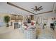 Open-concept living room showcasing modern design, stylish furnishings, and a seamless flow to the kitchen at 17702 Cresswind Ter, Bradenton, FL 34211