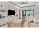 Bright living room with a decorative rug, stylish furniture, and a view of the backyard at 17702 Cresswind Ter, Bradenton, FL 34211