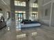 Spacious lobby boasts soaring ceilings, modern decor, marble floors, and comfortable seating at 17702 Cresswind Ter, Bradenton, FL 34211