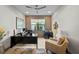 Well-lit office space with a modern desk, comfortable seating, and a view of the outdoors at 17702 Cresswind Ter, Bradenton, FL 34211