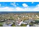 Aerial view of condo building and neighborhood at 2434 Australia E Way # 42, Clearwater, FL 33763