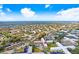 Aerial view of condo building and surrounding area at 2434 Australia E Way # 42, Clearwater, FL 33763