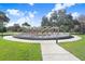 Circular archway with landscaping at 2434 Australia E Way # 42, Clearwater, FL 33763