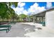 Outdoor BBQ area with picnic tables at 2434 Australia E Way # 42, Clearwater, FL 33763