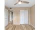 Spacious bedroom with light walls and double sliding doors at 2434 Australia E Way # 42, Clearwater, FL 33763