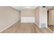 Simple dining area with light walls and wood-look floors at 2434 Australia E Way # 42, Clearwater, FL 33763