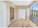 Sunroom with wood-look floors and sliding glass doors at 2434 Australia E Way # 42, Clearwater, FL 33763