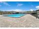 Community swimming pool with brick paver deck at 2434 Australia E Way # 42, Clearwater, FL 33763