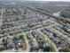 Aerial view of a residential neighborhood by the water at 3105 Pinon Dr, Holiday, FL 34691