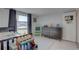 bedroom with a bed, dresser, and playful decor at 3105 Pinon Dr, Holiday, FL 34691