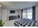 Bedroom with sliding doors leading to the pool area at 3105 Pinon Dr, Holiday, FL 34691