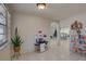 Kitchen with playful decor, and view into living room at 3105 Pinon Dr, Holiday, FL 34691