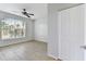 Bedroom featuring a ceiling fan, natural light, and tiled floors at 5606 Pinnacle Heights Cir # 304, Tampa, FL 33624