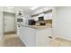 Kitchen with island and black appliances at 5606 Pinnacle Heights Cir # 304, Tampa, FL 33624