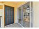 Private outdoor porch with a sliding glass door offering seamless indoor-outdoor living at 5606 Pinnacle Heights Cir # 304, Tampa, FL 33624