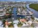 Aerial view of home, canal front, neighborhood at 6526 Bimini Ct, Apollo Beach, FL 33572