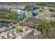 Home situated in a golf course community near a lake at 11116 Jenkins Ct, San Antonio, FL 33576